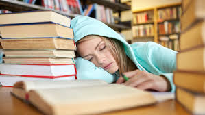 High schooler falling asleep while studying
